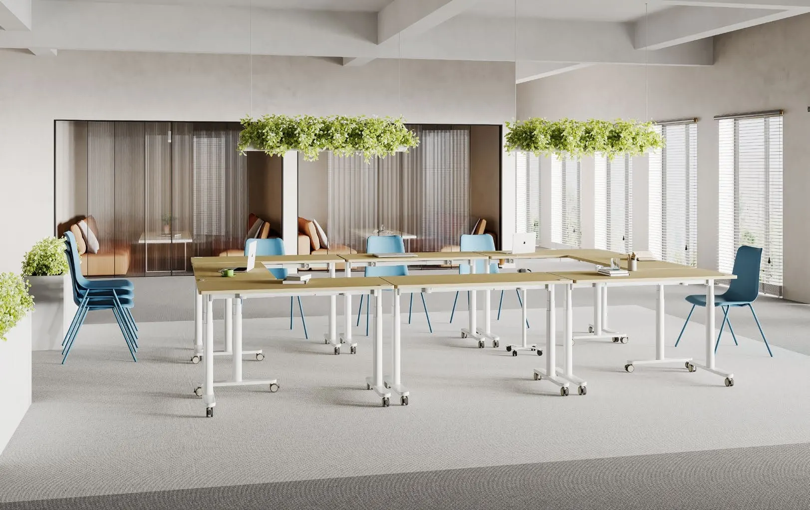 Rows of mobile oak flip-top training tables with white frames and casters in a bright training room