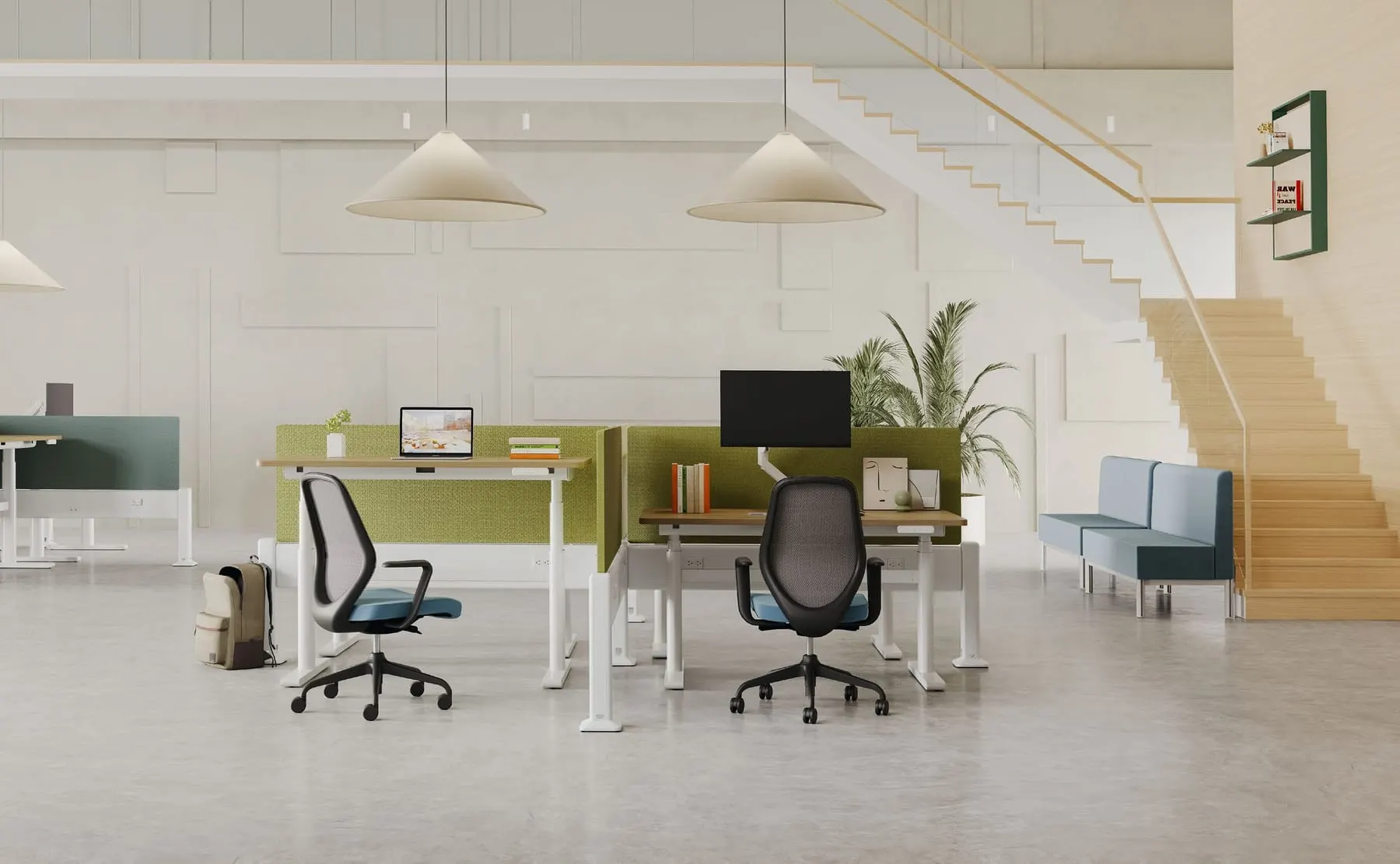 Sit-stand desks divided by lime-green screens on a white power beam with black mesh chairs